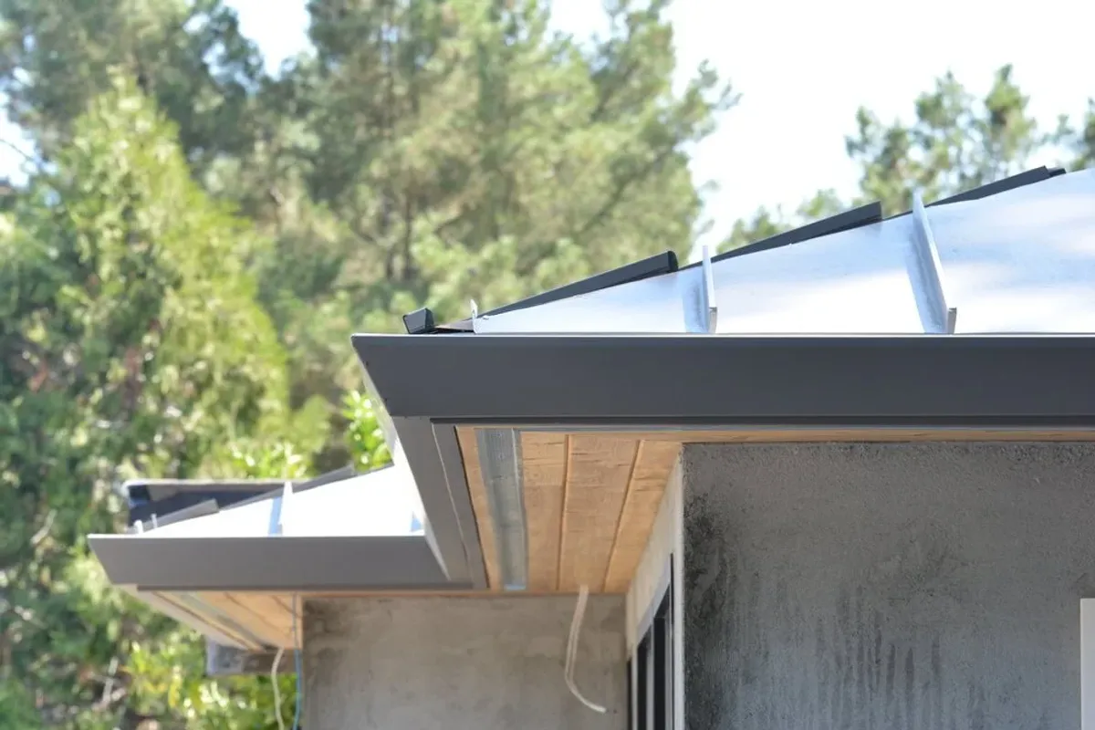 Roof and gutter work by DE Group, Inc.